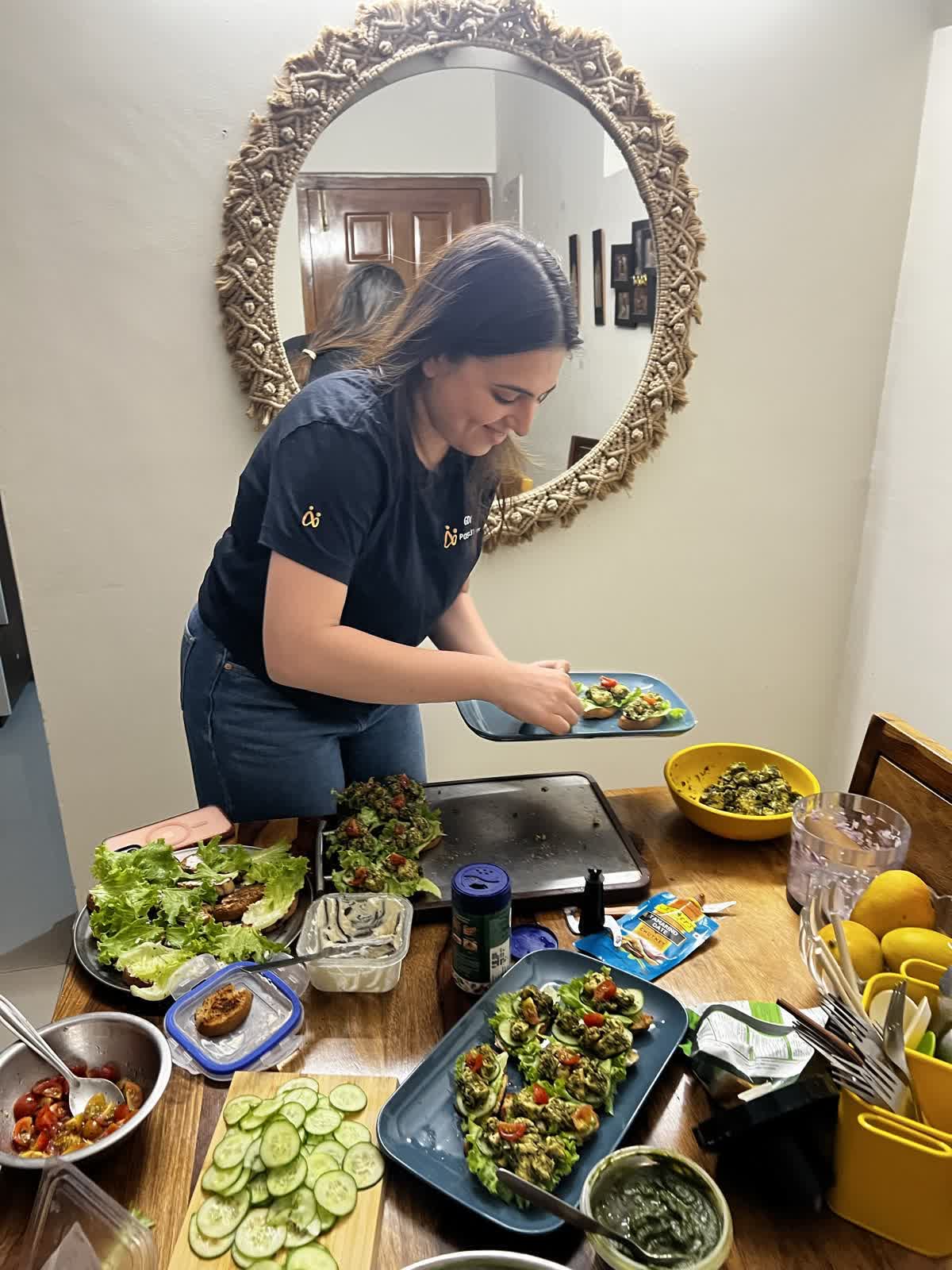 Pooja plating a catering order with love